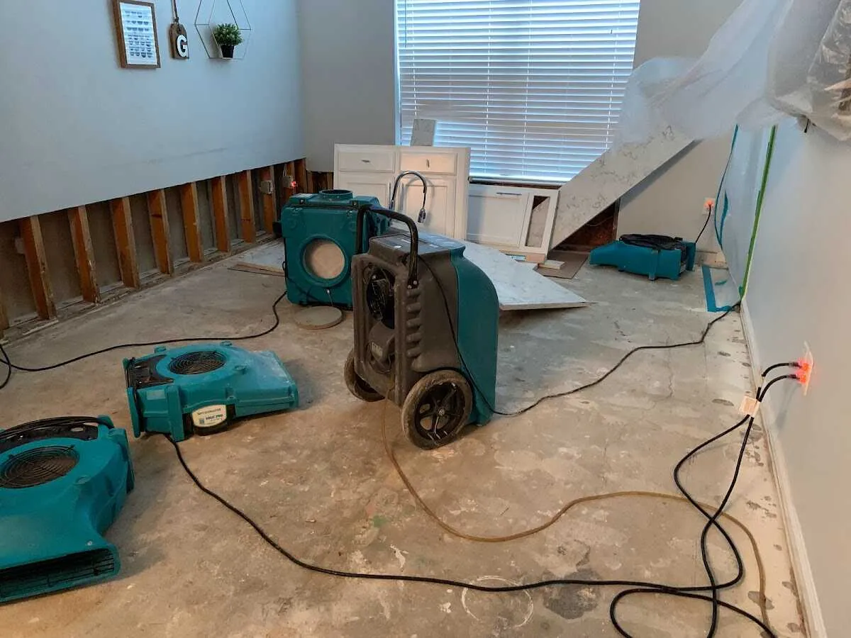 Dehumidifier in flood-cut room for Water Damage Restoration in Blooming Grove